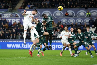 200126 - Swansea City v Blackburn Rovers - SkyBet Championship - Zan Vipotnik of Swansea City headers the ball to score a goal