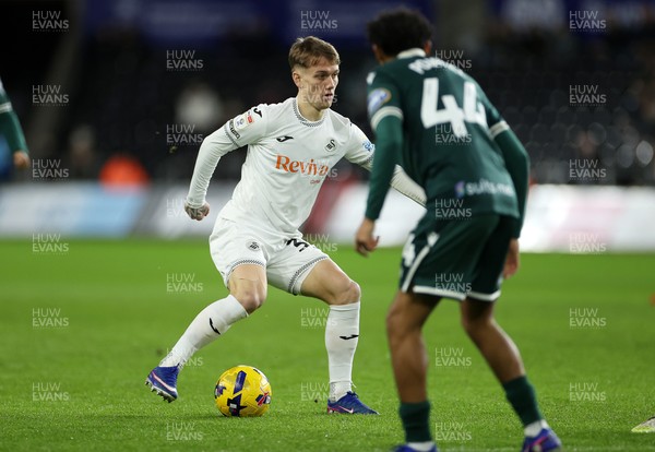 200126 - Swansea City v Blackburn Rovers - SkyBet Championship - Ethan Galbraith of Swansea City is challenged by Brandon Powell of Blackburn Rovers 