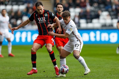 220225 - Swansea City v Blackburn Rovers - Sky Bet Championship - Goncalo Franco of Swansea City battles for the ball with Yuri Ribeiro of Blackburn Rovers