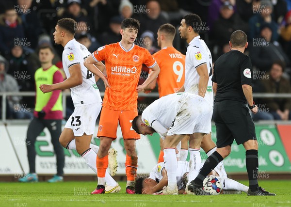 150223 - Swansea City v Blackpool, EFL Sky Bet Championship - Charlie Patino of Blackpool looks on after being shown a red card