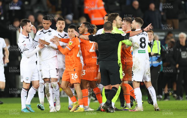 150223 - Swansea City v Blackpool, EFL Sky Bet Championship - Players are separated by the referee as the final is blown