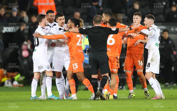150223 - Swansea City v Blackpool, EFL Sky Bet Championship - Players are separated by the referee as the final is blown