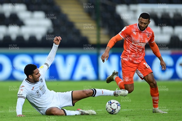 201121 - Swansea City v Blackpool - Sky Bet Championship - Ben Cabango of Swansea City vies for possession with Keshi Anderson of Blackpool 