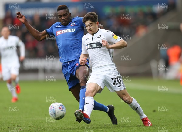 020319 - Swansea City v Bolton Wanderers, Sky Bet Championship - Daniel James of Swansea City is challenged by Sammy Ameobi of Bolton Wanderers