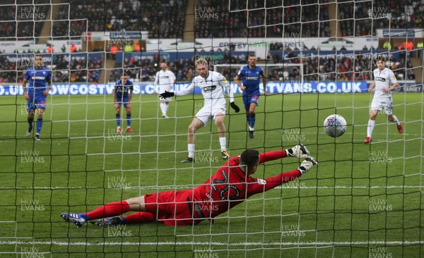 020319 - Swansea City v Bolton Wanderers, Sky Bet Championship - Bolton Wanderers goalkeeper Remi Matthews saves penalty from Oli McBurnie of Swansea City