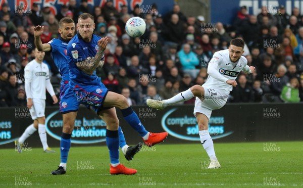 020319 - Swansea City v Bolton Wanderers, Sky Bet Championship - Matt Grimes of Swansea City fires a shot at goal