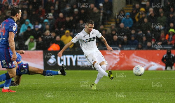020319 - Swansea City v Bolton Wanderers, Sky Bet Championship - Bersant Celina of Swansea City shoots to score Swansea's second goal