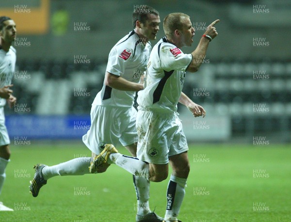 030206 Swansea City v Bournemouth Swansea's Andy Robinson celebrates his goal with Kevin McLeod 