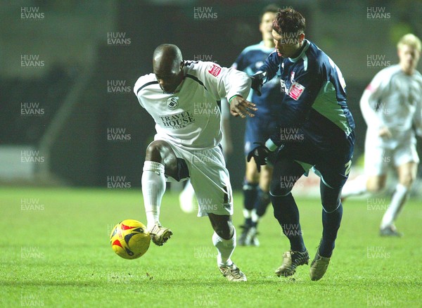 030206 Swansea City v Bournemouth Swansea's Adrian Forbes holds off Callum Hart  