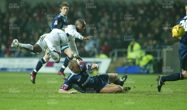 030206 Swansea City v Bournemouth Swansea's Leon Knight is tackled by Neil Young  