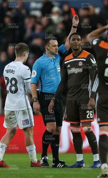170219 - Swansea City v Brentford, FA Cup Fifth Round - Ezri Konsa of Brentford is shown a red card