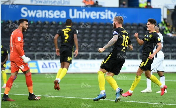 260720 - Swansea City v Brentford - EFL SkyBet Championship Play-Off - David Raya, Pontus Jansson and Christian Norgaard of Brentford celebrates saving a penalty