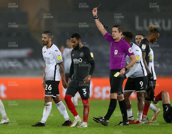 270121 - Swansea City v Brentford - SkyBet Championship - Kyle Naughton of Swansea City is given a red card by referee John Brooks