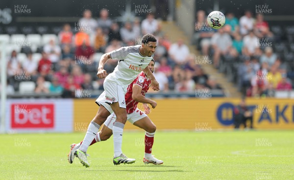 020923 - Swansea City v Bristol City, Sky Bet Championship - Ben Cabango of Swansea City heads the ball forward