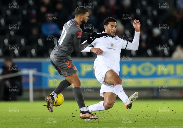 170123 - Swansea City v Bristol City - FA Cup 3rd Round Reply - Nahki Wells of Bristol City is challenged by Ben Cabango of Swansea City 