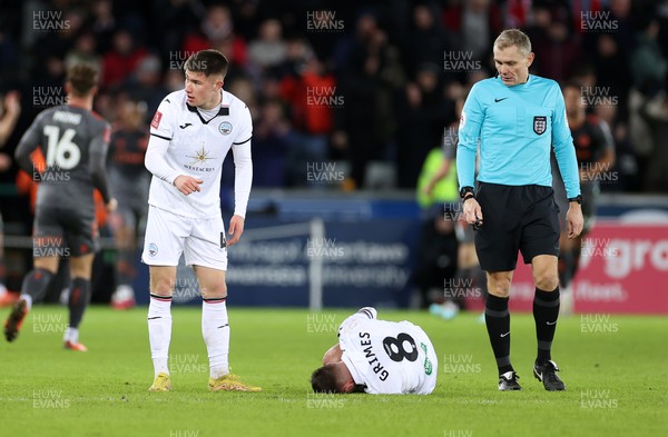 170123 - Swansea City v Bristol City - FA Cup 3rd Round Reply - Cameron Congreve looks over the the bench as Matt Grimes of Swansea City is on the floor