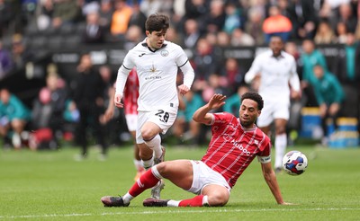 190323 - Swansea City v Bristol City, EFL Sky Bet Championship - Liam Walsh of Swansea City is tackled by Zak Vyner of Bristol City