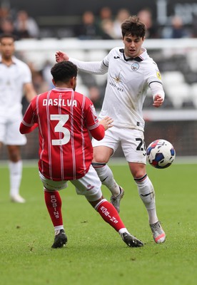 190323 - Swansea City v Bristol City, EFL Sky Bet Championship - Liam Walsh of Swansea City takes on Jay Dasilva of Bristol City