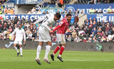 190323 - Swansea City v Bristol City, EFL Sky Bet Championship - Joel Piroe of Swansea City heads at goal only to hit the post