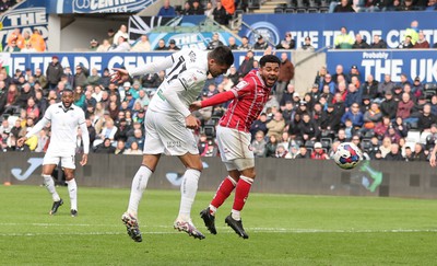 190323 - Swansea City v Bristol City, EFL Sky Bet Championship - Joel Piroe of Swansea City heads at goal only to hit the post