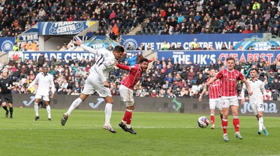 190323 - Swansea City v Bristol City, EFL Sky Bet Championship - Joel Piroe of Swansea City heads at goal only to hit the post