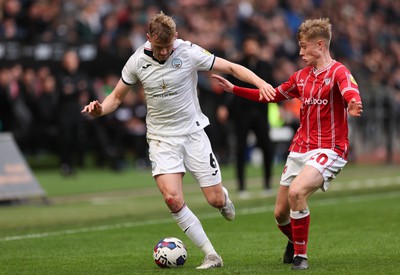 190323 - Swansea City v Bristol City, EFL Sky Bet Championship - Harry Darling of Swansea City takes on Sam Bell of Bristol City