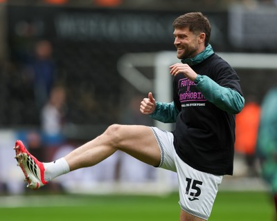 210226 - Swansea City v Bristol City - Sky Bet Championship - Cameron Burgess of Swansea City warms up