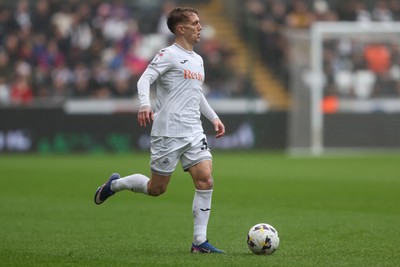 210226 - Swansea City v Bristol City - Sky Bet Championship - Ethan Galbraith of Swansea City attacks 