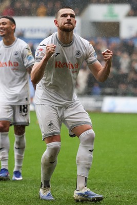 210226 - Swansea City v Bristol City - Sky Bet Championship - Zan Vipotnik of Swansea City celebrates scoring the first goal