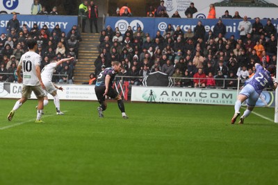 210226 - Swansea City v Bristol City - Sky Bet Championship - Zan Vipotnik of Swansea City shoots and scores their first goal