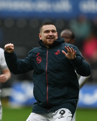 210226 - Swansea City v Bristol City - Sky Bet Championship - Zan Vipotnik of Swansea City celebrates at full-time