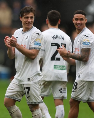 210226 - Swansea City v Bristol City - Sky Bet Championship - Goncalo Franco (L) and Gustavo Nunes of Swansea City (R) applaud the fans 