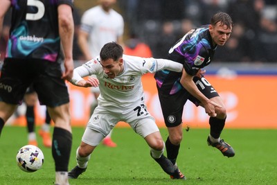 210226 - Swansea City v Bristol City - Sky Bet Championship - Scott Twine of Bristol City fouls Leo Walta of Swansea City 