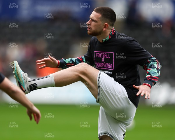 210226 - Swansea City v Bristol City - Sky Bet Championship - Zan Vipotnik of Swansea City warms up