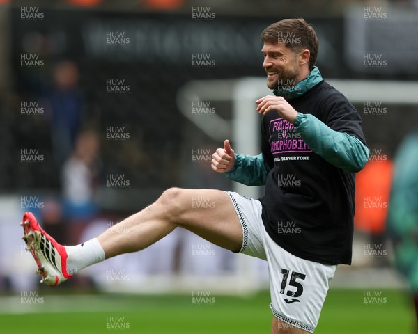 210226 - Swansea City v Bristol City - Sky Bet Championship - Cameron Burgess of Swansea City warms up
