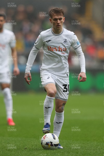 210226 - Swansea City v Bristol City - Sky Bet Championship - Ethan Galbraith of Swansea City attacks 