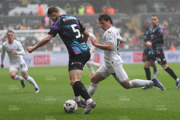 210226 - Swansea City v Bristol City - Sky Bet Championship - Goncalo Franco of Swansea City pressures Rob Atkinson of Bristol City