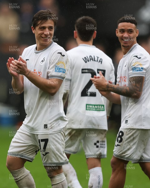 210226 - Swansea City v Bristol City - Sky Bet Championship - Goncalo Franco (L) and Gustavo Nunes of Swansea City (R) applaud the fans 