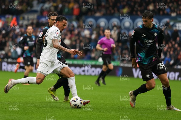 210226 - Swansea City v Bristol City - Sky Bet Championship - Ronald of Swansea City attacks with pressure from Noah Eile of Bristol City