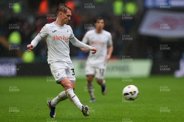 210226 - Swansea City v Bristol City - Sky Bet Championship - Ethan Galbraith of Swansea City passes the ball