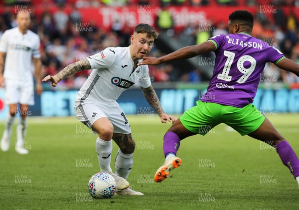 250818 - Swansea City v Bristol City, Sky Bet Championship - Barrie McKay of Swansea City looks for a away past Niclas Eliasson of Bristol City