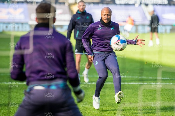 270221 - Swansea City v Bristol City - Sky Bet Championship - Andre Ayew of Swansea City warms up 