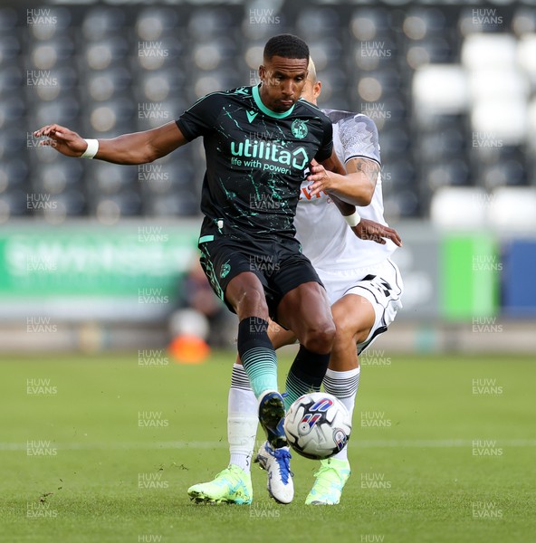 250723 - Swansea City v Bristol Rovers - Pre Season Friendly - Scott Sinclair of Bristol Rovers is challenged by Nathan Wood of Swansea City 