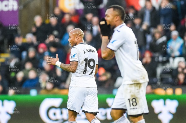100218 - Swansea City v Burnley - Premier League - Brothers Andre Ayew of Swansea City and Jordan Ayew of Swansea City react after missing a chance on goal 