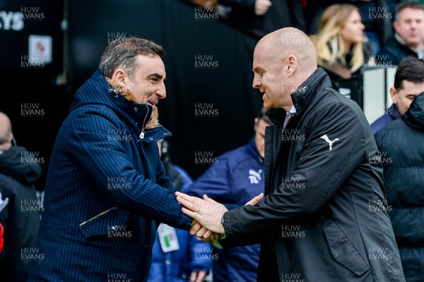100218 - Swansea City v Burnley - Premier League - Carlos Carvalhal shakes hands with Sean Dyche, Manager of Burnley