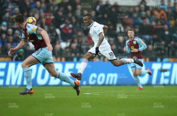100218 - Swansea City v Burnley, Premier League - Jordan Ayew of Swansea City plays the ball forward