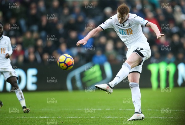 100218 - Swansea City v Burnley, Premier League - Sam Clucas of Swansea City fires a shot at goal