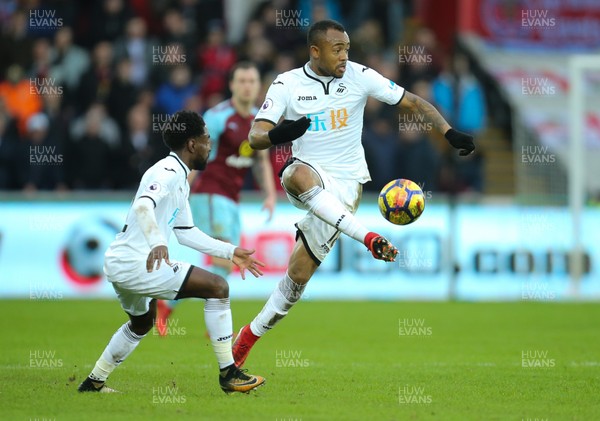 100218 - Swansea City v Burnley, Premier League - Jordan Ayew of Swansea City plays the ball forward