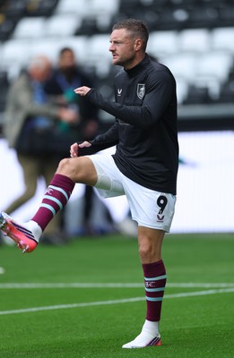 120926 Swansea City v Burnley, EFL Sky Bet Championship - Jamie Vardy of Burnley warms up as he is announced on the replacements bench for the match