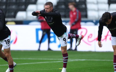 120926 Swansea City v Burnley, EFL Sky Bet Championship - Jamie Vardy of Burnley warms up as he is announced on the replacements bench for the match